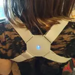 woman using Smart Posture Corrector